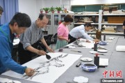 免费算卦两岸艺术家在安徽“共绘一幅画”